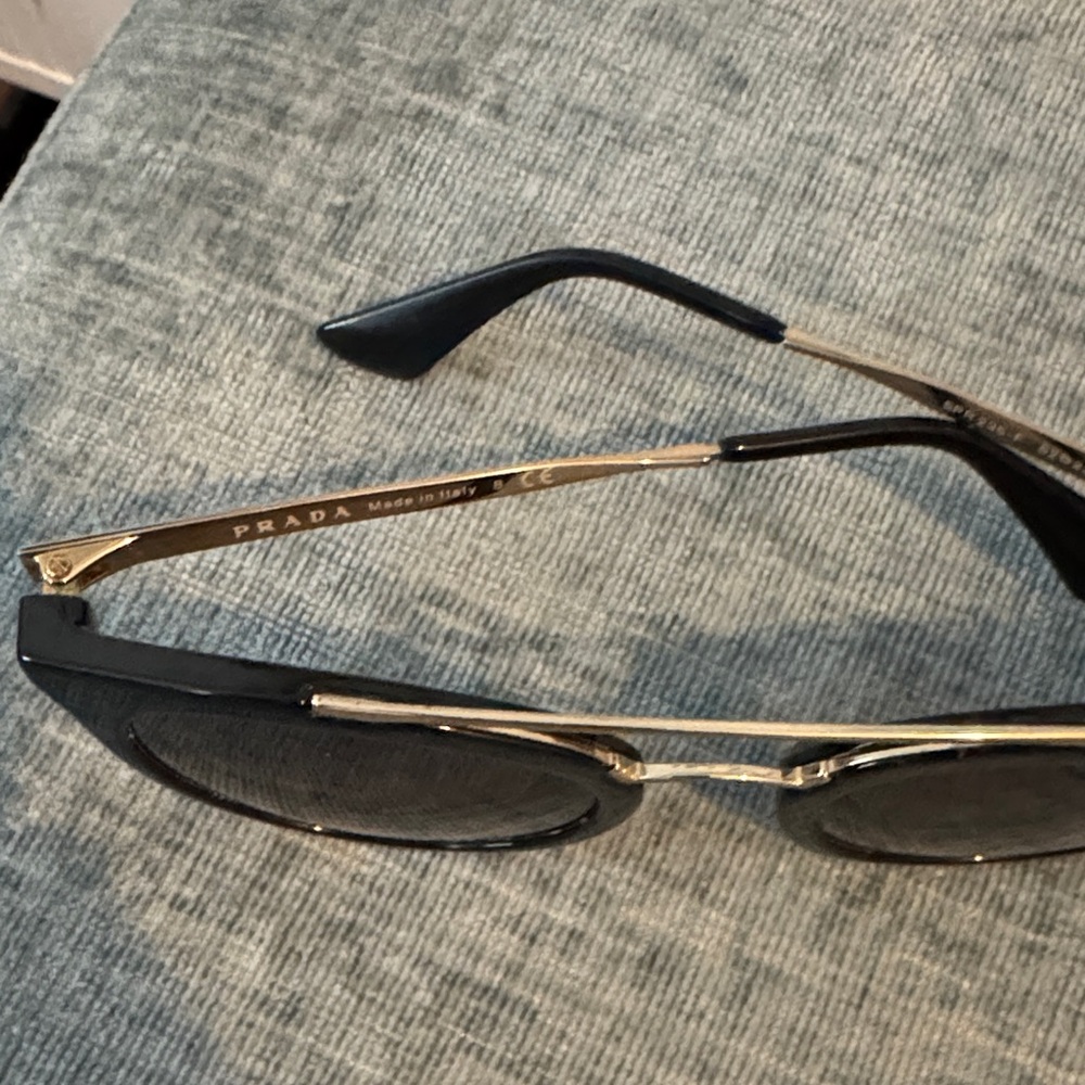 Prada Black Round Cat-Eye Sunglasses with Gold Bridge - Picture 2 of 3